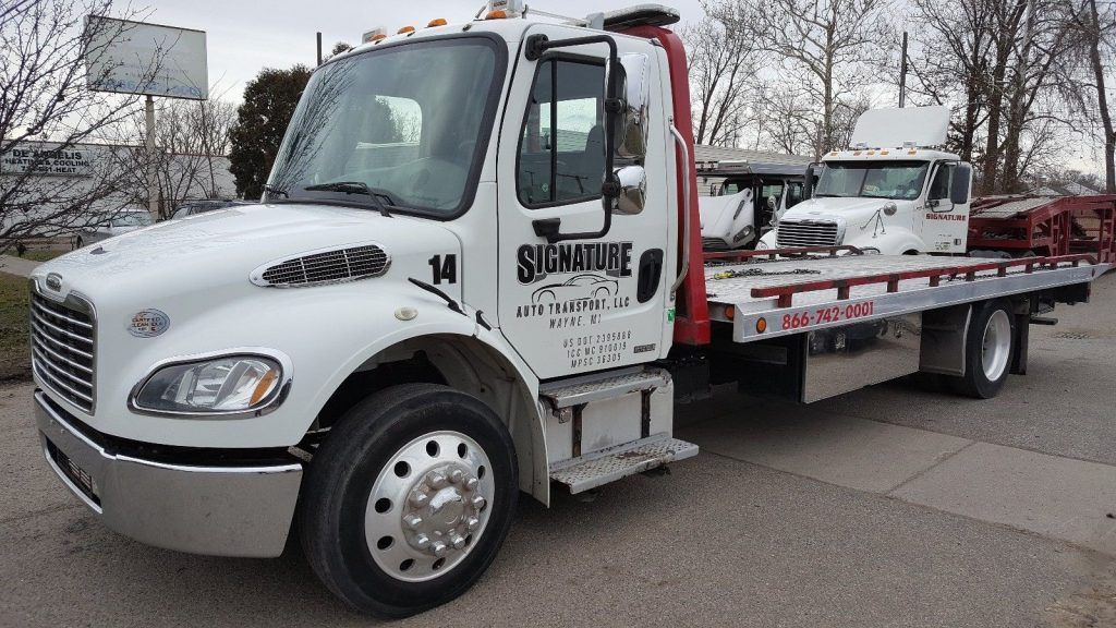 good condition 2011 Freightliner 2 Car Flatbed tow truck