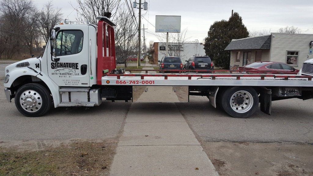 good condition 2011 Freightliner 2 Car Flatbed tow truck for sale