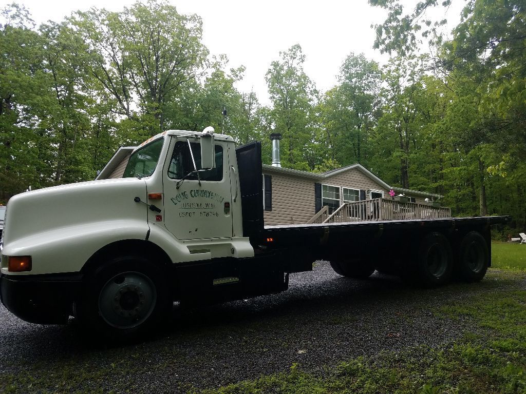 minor damage 1990 International 8300 Flatbed dump truck for sale
